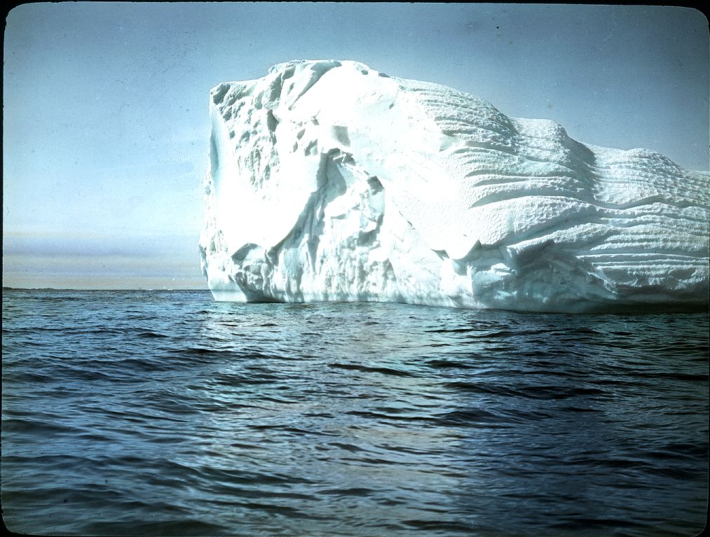 Floating iceberg with air melting furrows