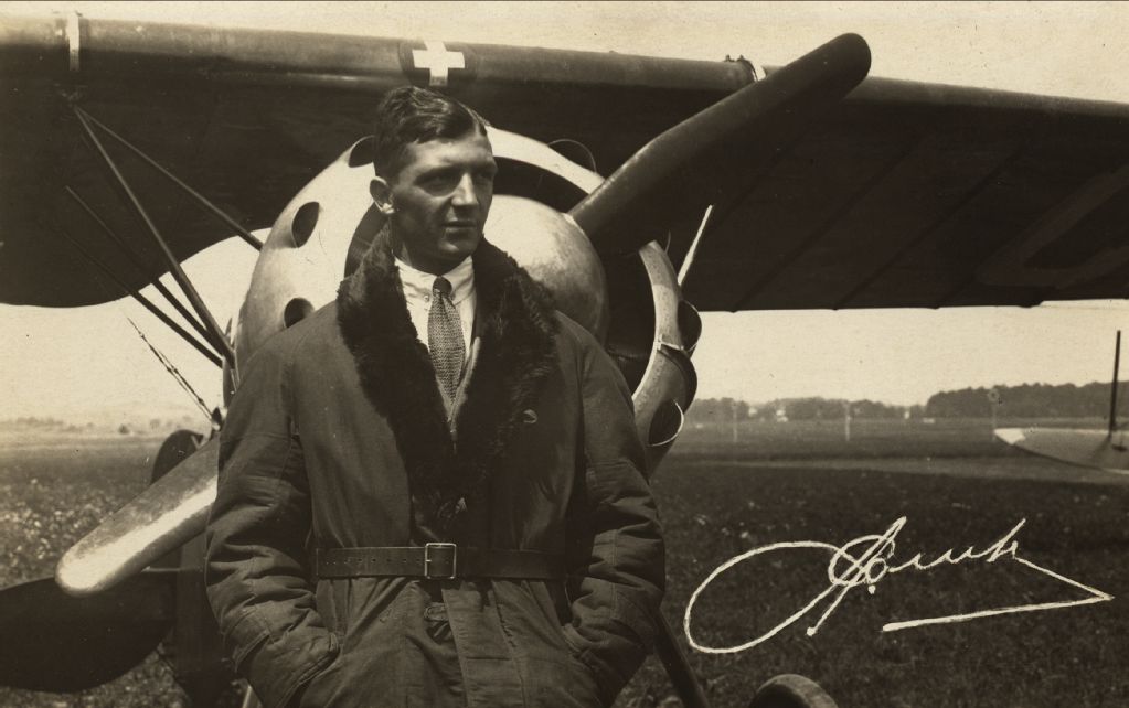 Alfred Comte, pilot and designer in front of high-wing aircraft, Schwamendingen [?]