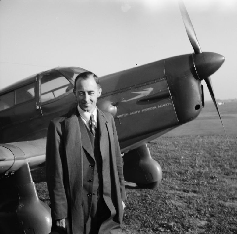 D.C.T. Bennett in front of G-AGTH Percival Proctor 'Star Pixie'.