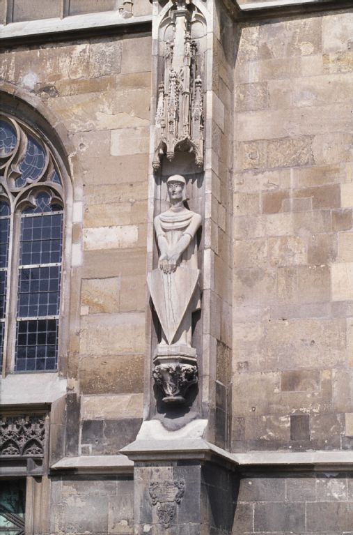 Minster, cathedral, buttress with modern figure