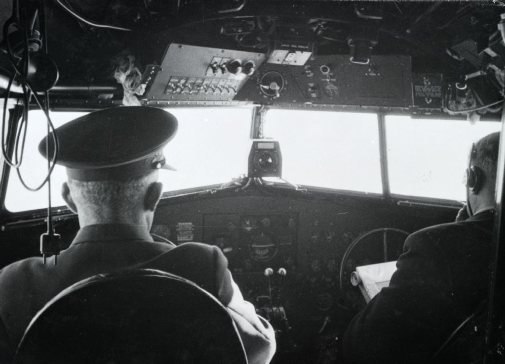 Walter Mittelholzer in the cockpit of a Douglas DC-2 of Swissair