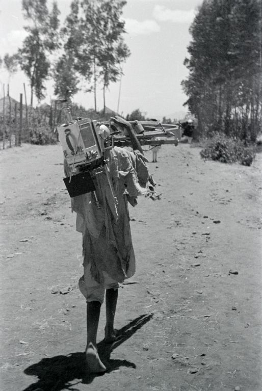 Man carrying camera