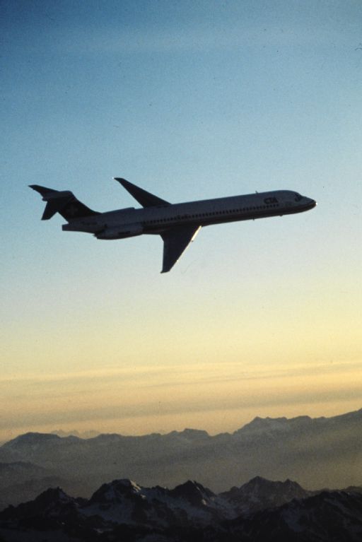 McDonnell Douglas MD-87 of the CTA in flight over the mountains