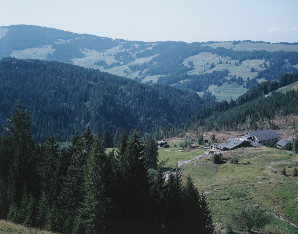 Plasselb FR, south view of the western slope Chleuwena with the landslide and the destroyed and cleared vacation home settlement Falli-Hölli