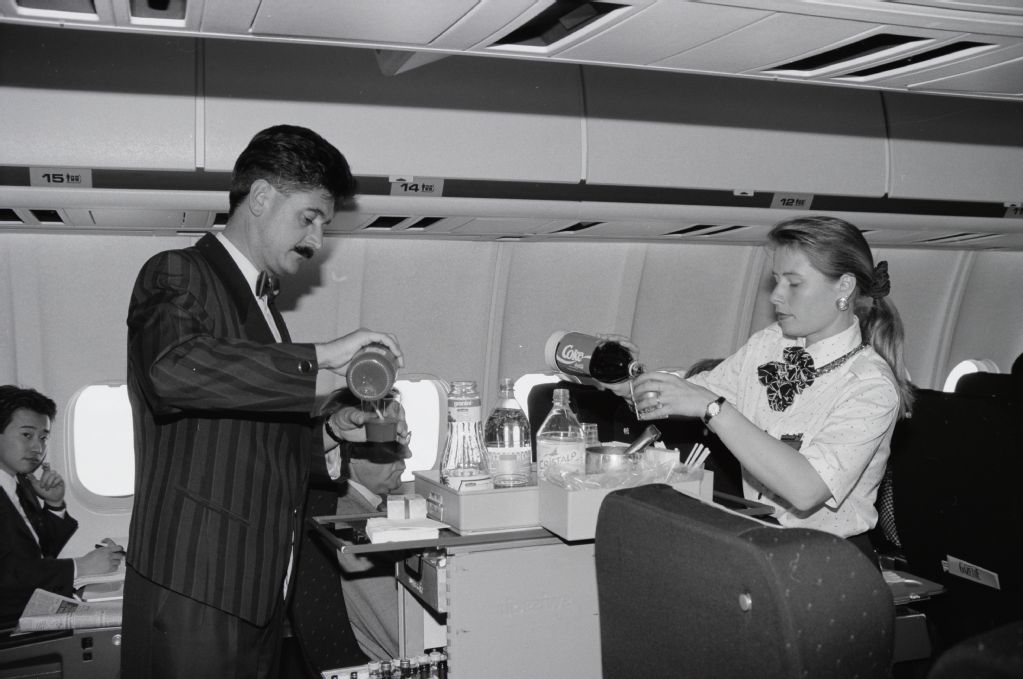Onboard service in the business class cabin of a Swissair MD-11