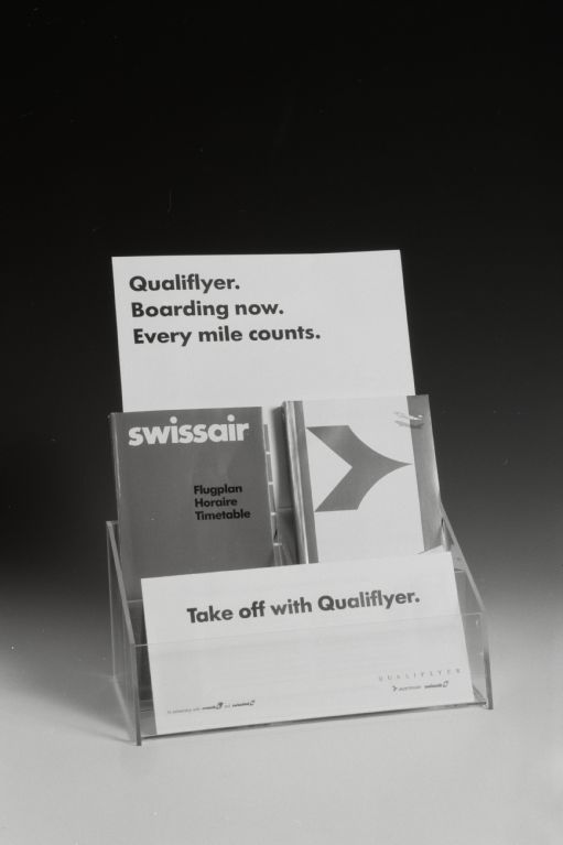 Swissair flight schedule and Qualiflyer brochure