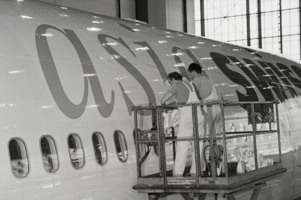 Painting of McDonnell Douglas MD-11, HB-IWN with Swissair-Asia lettering in the shipyard at Zurich-Kloten Airport