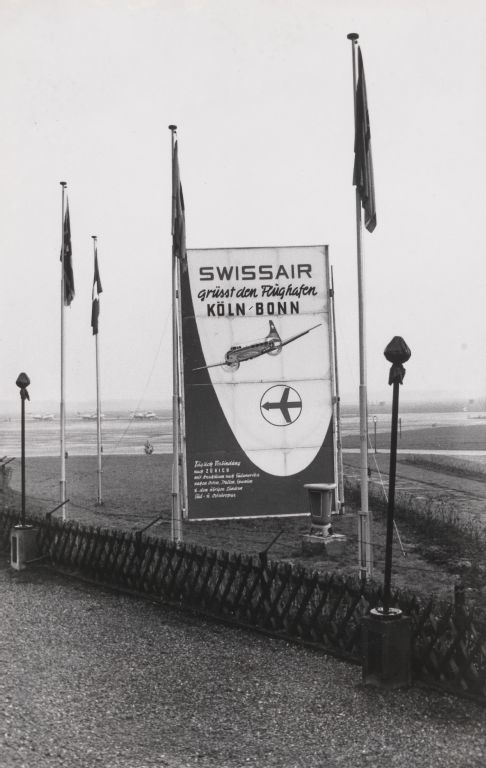 Swissair inaugural flight to Cologne : advertising board
