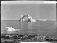 Godhavn. Stranded iceberg gate. Bay at the Arctic Biological Station. Station