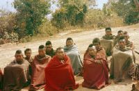 North Burma, the elders of a Naga village hold council