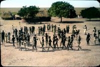 Village square in Abwong. The Dinkas gather for the sacrificial dance in honor of the guests