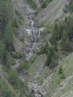 Lower Engadine, dangerous torrent with barriers in Val Sot ob Tschlin