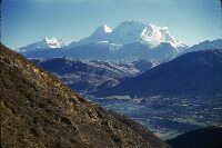 Peru: Huascaran, 6768 m Cordillera Blanca in front the Santa valley with the town of Huaras