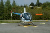 Helicopter Robinson R22, HB-XXQ of the Rüdisühli Heli Group