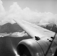 Douglas DC-2 115-B, HB-ITO in flight over Limmerengletscher and Bifertenstock, Glarus Alps, looking southeast (SE)