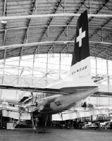 Douglas DC-7C-1229 C Seven Seas, HB-IBL "Genève" in the arch hangar at Zurich-Kloten