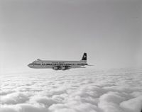 Douglas DC-7C-1229 C Seven Seas, HB-IBL "Genève" in flight