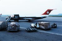 Cargo loading into the McDonnell Douglas DC-9-33 F Freighter, HB-IFW "Payerne" at Zurich-Kloten