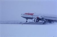 McDonnell Douglas MD-11, HB-IWL "Appenzell" landing at Zurich-Kloten in winter