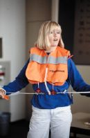 Swissair flight attendant explains the life jacket