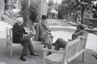 Three gentlemen in front of Cherkley Court estate, Leatherhead