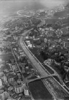 Chiasso, Vacallo, new outdoor swimming pool, construction sites national road N2/motorway A2, canalized Breggia, view to northwest (NW)