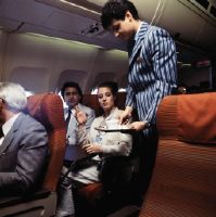 Onboard service in the economy class cabin of a Swissair Airbus A310-221