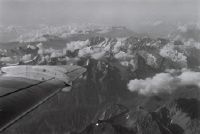 View over the right wing of a Sud-Aviation SE-210 Caravelle III in flight over the Mont Blanc massif
