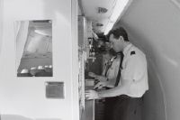 Air steward in the galley of a Swissair plane