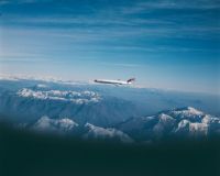 McDonnell Douglas DC-9-81, HB-INC "Thurgau", later "Lugano" in flight over Val Anzasca in Piedmont, looking east (E)