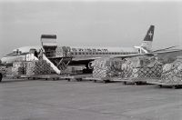 Freight pallets in front of the McDonnell Douglas DC-8-62 CF, HB-IDH "Piz Bernina" at Zurich-Kloten