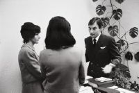 Briefing by the air steward with two Swissair air hostesses in crew control at Zurich-Kloten airport