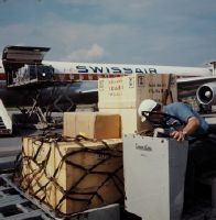 Cargo loading into a Swissair plane at Zurich-Kloten airport