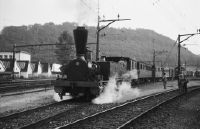 Olten, railroad station, steam locomotive Ec 2/5 Geneva with historic railroad carriages
