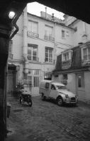 Paris, tenements, courtyard with 2CV