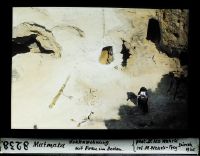 Matmata, cave dwelling with woman in floor