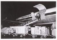 Cargo loading into the Douglas DC-6A Freighter, HB-IBB "Nidwalden" in Zurich-Kloten