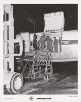 Cargo loading into the Douglas DC-6A Freighter, HB-IBB "Nidwalden" at Zurich-Kloten