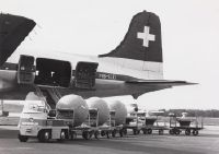Zurich-Kloten, cargo loading of sewage treatment plants into Balair's Douglas DC-4-1009, HB-ILD