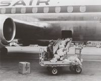 Cargo loading into a Swissair Douglas DC-8 at Zurich-Kloten
