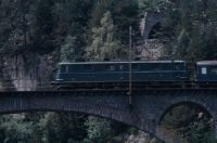 Wassen, SBB canton locomotive Ae 6/6 11416 "Glarus" with passenger train on the Meienreuss bridge