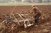 Arable farming, farmer turning the plow